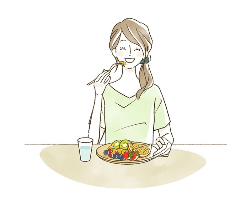 美白を目指すためにフルーツを食べる女性のイラスト