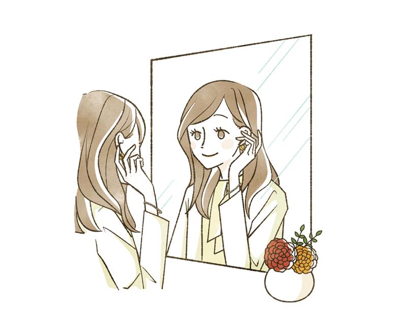 鏡を見て身なりを整える女性のイラスト