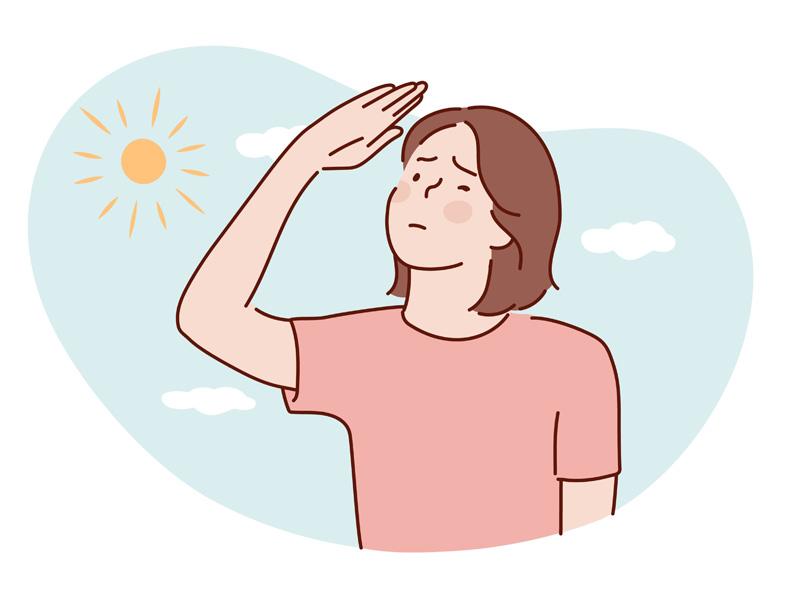 紫外線によるダメージを気にして手で太陽を遮る女性のイラスト