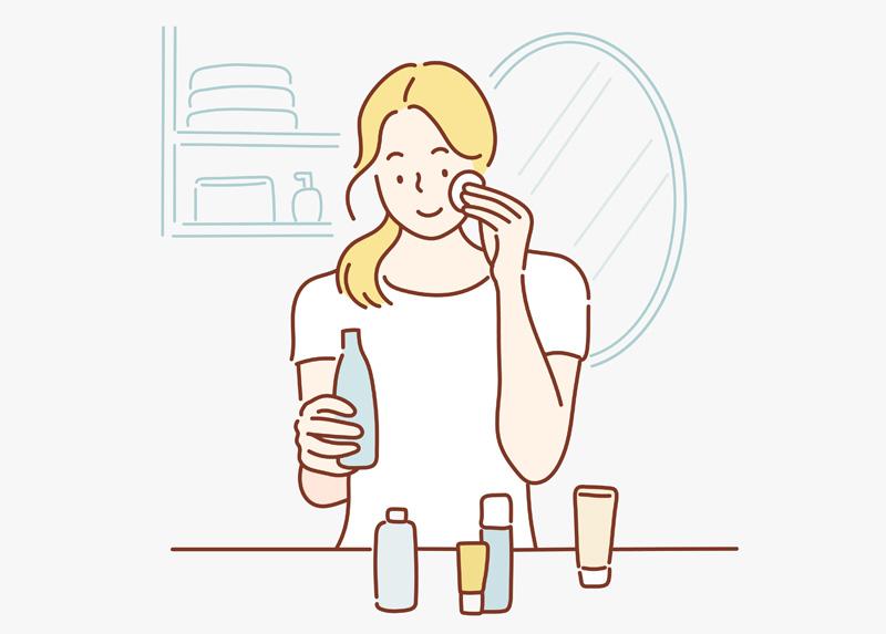 コットンと化粧水などを使いスキンケアをしている女性のイラスト